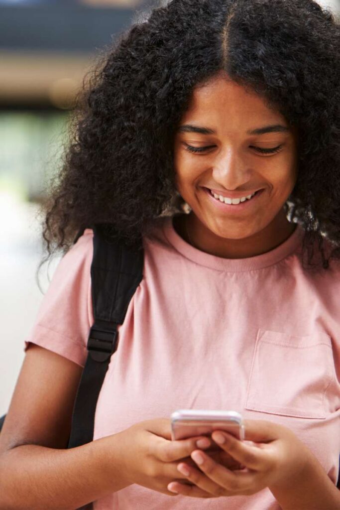 Young woman Requesting Information from her phone